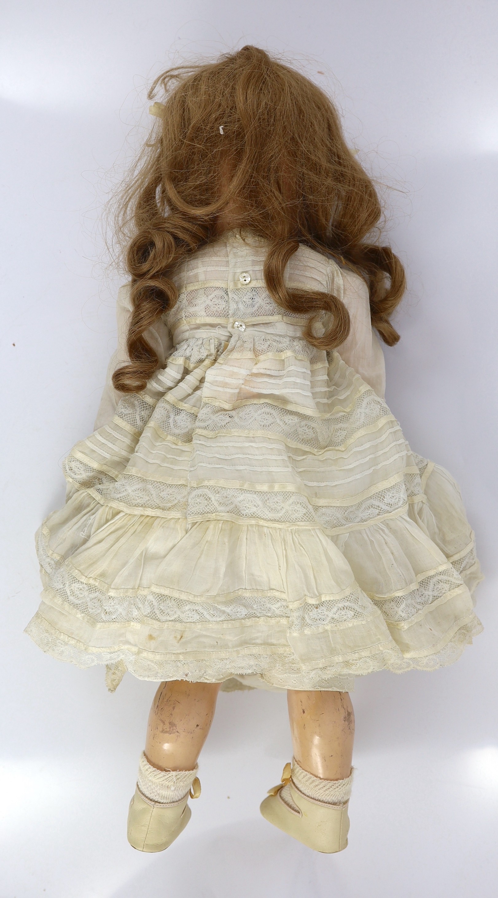 A Cuno and Otto Dressel Jutta bisque doll, German, circa 1920, 25in.